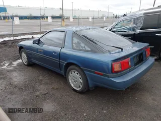 1986 Toyota Supra z VIN JT2MA70L1G0003588, wystawiony jako IAAI lot #41947537 z przebiegiem 110 979 mil mil oraz . Historia ofert i sprzedaży dostępna na DreamBid. Obrazek 3.