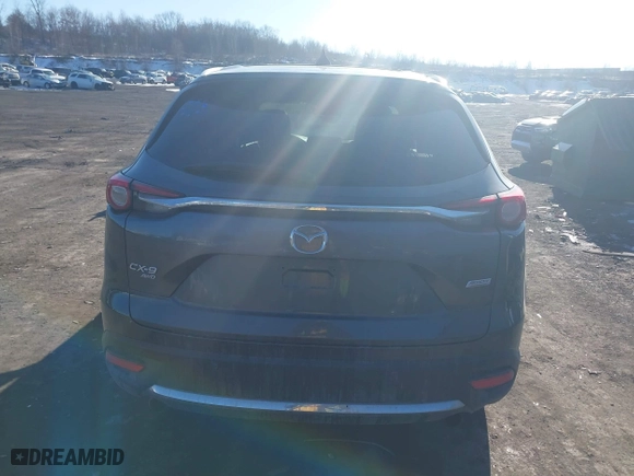 2016 Mazda CX-9 Signature with VIN JM3TCBEY3G0104689, listed as a IAAI auction lot 41257053 with 116,486 mi miles. Bid and sale history available at carsss.com. Image 16.
