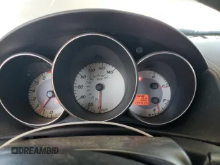 2008 Mazda 3 i Sport with VIN JM1BK12F381791446, listed as a Copart auction lot 43810635 with 134,415 mi miles and Salvage Title. Bid and sale history available at DreamBid. Image 9.