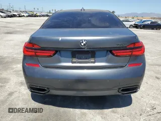 2018 BMW 7 Series 740i with VIN WBA7E2C59JG742809, listed as a Copart auction lot 66995934 with 62,017 mi miles and Salvage Title. Bid and sale history available at carsss.com. Image 6.