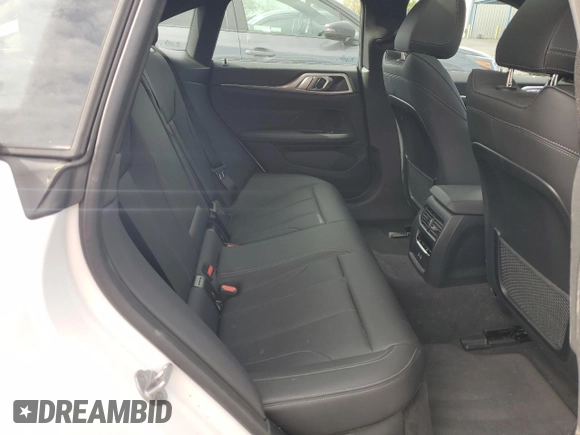 2024 BMW i4 eDrive35 z VIN WBY43AW00RFT22457, wystawiony jako Copart lot #53167205 z przebiegiem 3329 mil mil oraz Szkody całkowita. Historia ofert i sprzedaży dostępna na DreamBid. Obrazek 10.