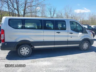 2016 Ford Transit Wagon XL with VIN 1FBZX2ZM8GKA69218, listed as a IAAI auction lot 42027106 with 311,419 mi miles. Bid and sale history available at carsss.com. Image 13.