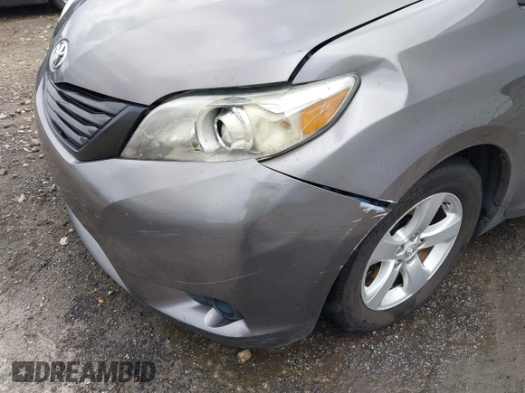 2015 Toyota Sienna L with VIN 5TDZK3DC8FS678539, listed as a IAAI auction lot 42115498 with 111,417 mi miles and . Bid and sale history available at DreamBid. Image 6.