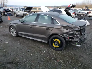 2015 Audi A3 2.0T Prestige with VIN WAUKFGFFXF1020252, listed as a Copart auction lot 84533014 with 70,945 mi miles and Salvage Title. Bid and sale history available at carsss.com. Image 2.