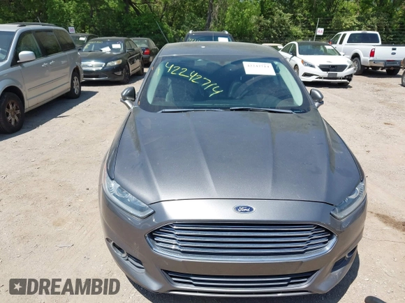 2014 Ford Fusion SE with VIN 3FA6P0HD7ER328428, listed as a IAAI auction lot 42242714 with 74,199 mi miles and . Bid and sale history available at DreamBid. Image 6.