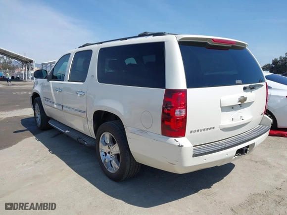 2008 Chevrolet Suburban LTZ with VIN 1GNFC16058R198040, listed as a IAAI auction lot 41421238 with 215,591 mi miles. Bid and sale history available at carsss.com. Image 3.