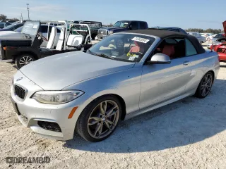 2015 BMW 2 Series M235i with VIN WBA1M1C52FVZ99476, listed as a Copart auction lot 74385694 with 0 mi miles and Salvage Title. Bid and sale history available at carsss.com. Image 1.