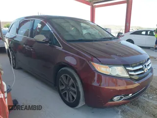 2014 Honda Odyssey Touring with VIN 5FNRL5H90EB080889, listed as a IAAI auction lot 42085305 with 123,286 mi miles and . Bid and sale history available at carsss.com. Image 13.