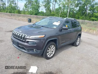 2014 Jeep Cherokee Limited z VIN 1C4PJMDSXEW294199, wystawiony jako IAAI lot #42466782 z przebiegiem 137 783 mil mil oraz . Historia ofert i sprzedaży dostępna na DreamBid. Obrazek 2.