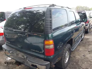 2001 Chevrolet Tahoe LT with VIN 1GNEK13T51R116634, listed as a IAAI auction lot 42106345 with 264,916 mi miles. Bid and sale history available at carsss.com. Image 4.