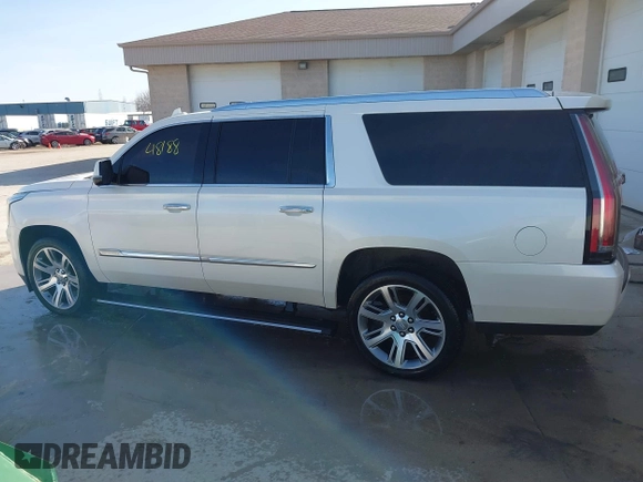 2015 Cadillac Escalade ESV Premium z VIN 1GYS4TKJ9FR700022, wystawiony jako IAAI lot #41748188 z przebiegiem 166 416 mil mil oraz . Historia ofert i sprzedaży dostępna na DreamBid. Obrazek 14.