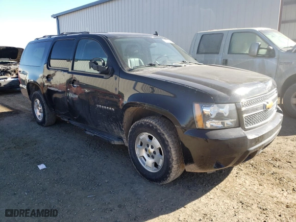 2014 Chevrolet Suburban LT with VIN 1GNSKJE73ER246291, listed as a Copart auction lot 74231304 with 140,688 mi miles and Salvage Title. Bid and sale history available at carsss.com. Image 7.