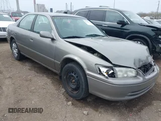 2001 Toyota Camry CE with VIN 4T1BG22K01U060588, listed as a IAAI auction lot 42040071 with 165,446 mi miles and . Bid and sale history available at carsss.com. Image 1.