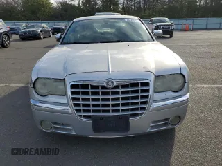 2006 Chrysler 300 C with VIN 2C3KK63H46H296625, listed as a Copart auction lot 70220974 with 104,811 mi miles and Salvage Title. Bid and sale history available at carsss.com. Image 5.