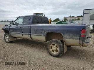 1999 Dodge Ram 2500 with VIN 1B7KF2368XJ511110, listed as a Copart auction lot 68945174 with 173,983 mi miles and Salvage Title. Bid and sale history available at carsss.com. Image 2.