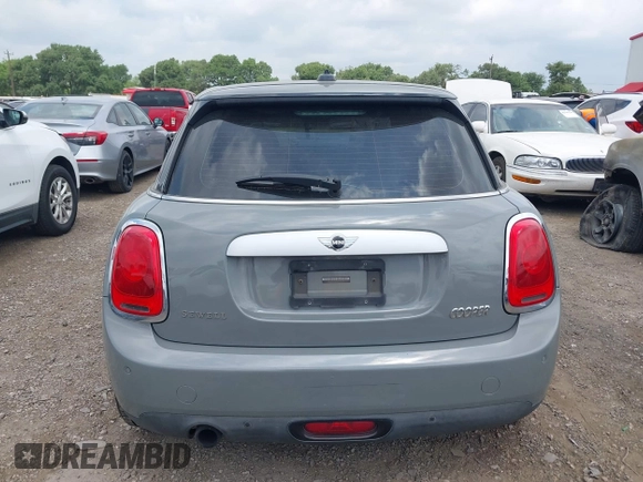 2015 MINI Hardtop 4 Door with VIN WMWXS5C56FT830418, listed as a IAAI auction lot 42132285 with 111,428 mi miles and . Bid and sale history available at DreamBid. Image 16.