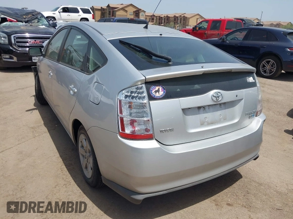 2008 Toyota Prius z VIN JTDKB20U087779744, wystawiony jako IAAI lot #40013342 z przebiegiem 84 999 mil mil oraz . Historia ofert i sprzedaży dostępna na DreamBid. Obrazek 3.