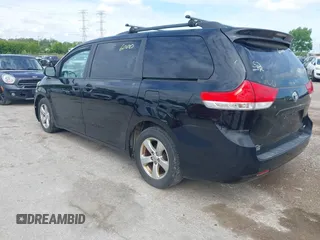 2013 Toyota Sienna LE AAS with VIN 5TDKK3DC3DS392029, listed as a IAAI auction lot 42366000 with 199,237 mi miles and . Bid and sale history available at DreamBid. Image 3.