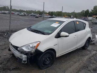 2016 Toyota Prius c One with VIN JTDKDTB32G1135152, listed as a IAAI auction lot 40400174 with 164,685 mi miles. Bid and sale history available at carsss.com. Image 2.