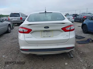 2016 Ford Fusion SE Hybrid with VIN 3FA6P0LU7GR356479, listed as a IAAI auction lot 42252046 with 119,046 mi miles and . Bid and sale history available at DreamBid. Image 16.