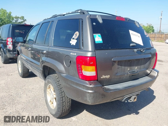 1999 Jeep Grand Cherokee Limited with VIN 1J4GW68N7XC617687, listed as a IAAI auction lot 42433705 with 186,312 mi miles and . Bid and sale history available at DreamBid. Image 3.