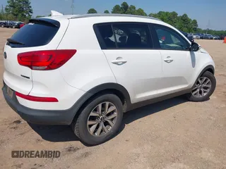 2015 Kia Sportage LX with VIN KNDPB3AC8F7720956, listed as a IAAI auction lot 41987551 with 178,281 mi miles and . Bid and sale history available at DreamBid. Image 4.