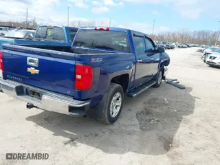 2014 Chevrolet Silverado 1500 LT with VIN 3GCUKREC0EG411632, listed as a IAAI auction lot 41890539 with 106,315 mi miles. Bid and sale history available at carsss.com. Image 4.