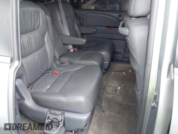 2007 Honda Odyssey EX-L with VIN 5FNRL38747B121059, listed as a IAAI auction lot 42211056 with 171,838 mi miles and . Bid and sale history available at DreamBid. Image 8.
