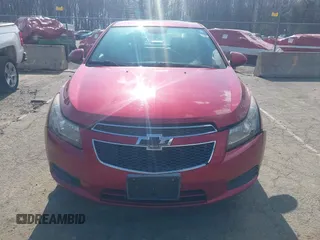 2014 Chevrolet Cruze 2LT z VIN 1G1PE5SB6E7450500, wystawiony jako IAAI lot #41977117 z przebiegiem 102 037 mil mil oraz . Historia ofert i sprzedaży dostępna na DreamBid. Obrazek 13.