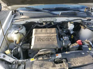 2010 Mercury Mariner z VIN 4M2CN9BG5AKJ16629, wystawiony jako Copart lot #85464894 z przebiegiem 101 587 mil mil oraz Szkoda całkowita • Salvage title. Historia ofert i sprzedaży dostępna na DreamBid. Obrazek 12.