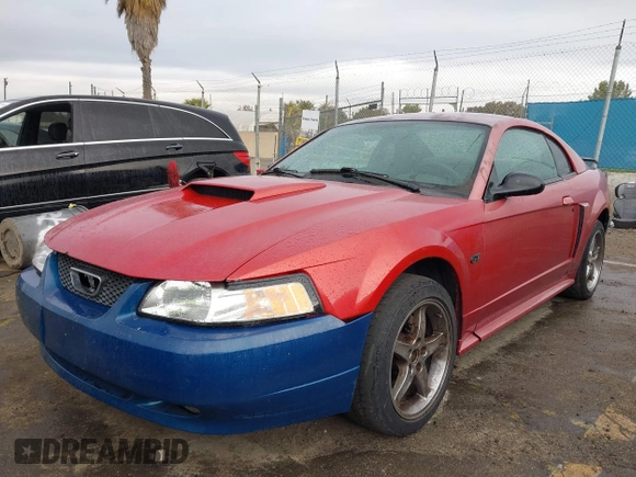2002 Ford Mustang GT Deluxe with VIN 1FAFP42X92F200811, listed as a IAAI auction lot 41778205 with 107,187 mi miles. Bid and sale history available at carsss.com. Image 2.