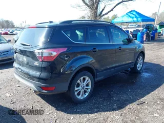 2018 Ford Escape SE with VIN 1FMCU0GD2JUA65979, listed as a IAAI auction lot 41894516 with 145,424 mi miles. Bid and sale history available at carsss.com. Image 4.
