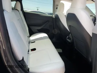 2024 Tesla Model Y Long Range with VIN 7SAYGDEE6RA226035, listed as a Copart auction lot 52539375 with 14,220 mi miles and Salvage title. Bid and sale history available at DreamBid. Image 10.