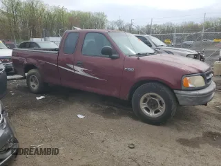 1998 Ford F-150 with VIN 1FTZX1727WNB55284, listed as a Copart auction lot 51781465 with 258,600 mi miles and Salvage title. Bid and sale history available at DreamBid. Image 4.