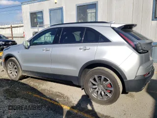 2021 Cadillac XT4 FWD Sport with VIN 1GYFZER41MF006261, listed as a Copart auction lot 45553664 with 14,402 mi miles and . Bid and sale history available at DreamBid. Image 2.