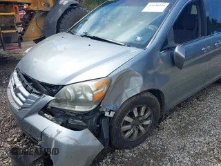 2010 Honda Odyssey EX with VIN 5FNRL3H4XAB015955, listed as a IAAI auction lot 42590535 with Not provided miles and . Bid and sale history available at DreamBid. Image 6.