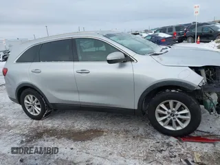 2019 Kia Sorento L with VIN 5XYPG4A31KG547981, listed as a IAAI auction lot 41253059 with 97,104 mi miles. Bid and sale history available at carsss.com. Image 13.