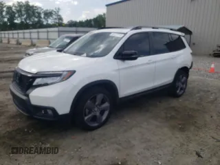 2021 Honda Passport Touring z VIN 5FNYF7H91MB015479, wystawiony jako Copart lot #56127214 z przebiegiem 28 039 mil mil oraz Szkoda całkowita • Salvage title. Historia ofert i sprzedaży dostępna na DreamBid. Obrazek 1.
