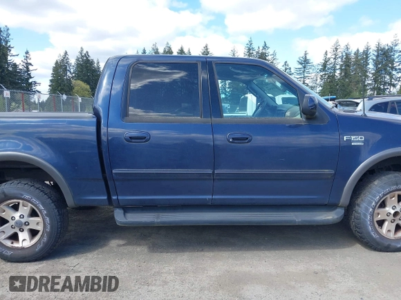 2003 Ford F-150 XLT with VIN 1FTRW08L93KD64270, listed as a IAAI auction lot 42088905 with 181,528 mi miles. Bid and sale history available at carsss.com. Image 13.