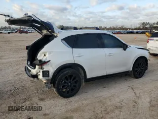 2024 Mazda CX-5 2.5 Carbon Turbo with VIN JM3KFBAY8R0443122, listed as a Copart auction lot 48023315 with 9,586 mi miles and Salvage Title. Bid and sale history available at carsss.com. Image 3.