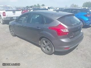 2014 Ford Focus SE with VIN 1FADP3K25EL317054, listed as a IAAI auction lot 42017856 with 131,862 mi miles. Bid and sale history available at carsss.com. Image 3.