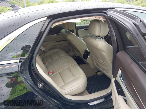 2014 Cadillac XTS Luxury with VIN 2G61M5S32E9231544, listed as a IAAI auction lot 42340088 with 74,518 mi miles and . Bid and sale history available at DreamBid. Image 8.