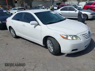 2009 Toyota Camry with VIN 4T4BE46K09R069059, listed as a IAAI auction lot 41852406 with 213,992 mi miles. Bid and sale history available at carsss.com. Image 1.