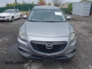 2015 Mazda CX-9 Sport with VIN JM3TB3BV2F0454770, listed as a IAAI auction lot 42009879 with 98,916 mi miles and . Bid and sale history available at carsss.com. Image 12.