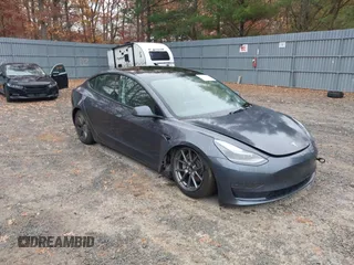 2022 Tesla Model 3 with VIN 5YJ3E1EA7NF339952, listed as a IAAI auction lot 38007332 with 10,726 mi miles. Bid and sale history available at carsss.com. Image 1.