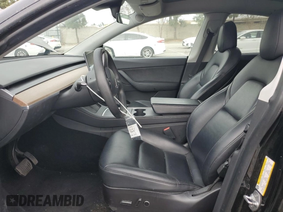 2021 Tesla Model Y Long Range z VIN 5YJYGAEE5MF143672, wystawiony jako Copart lot #55962875 z przebiegiem 74 644 mil mil oraz Szkoda całkowita • Salvage title. Historia ofert i sprzedaży dostępna na DreamBid. Obrazek 7.