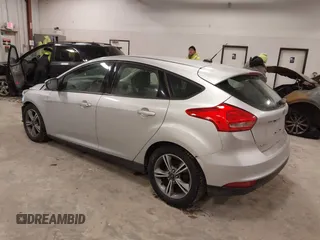 2016 Ford Focus SE with VIN 1FADP3KE2GL377824, listed as a IAAI auction lot 41461648 with 112,038 mi miles and . Bid and sale history available at carsss.com. Image 3.