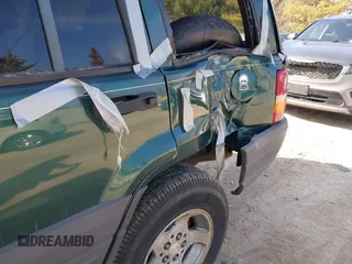 1997 Jeep Grand Cherokee Laredo with VIN 1J4GZ58S2VC595442, listed as a IAAI auction lot 41772133 with 229,764 mi miles. Bid and sale history available at carsss.com. Image 15.