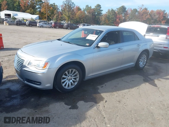 2012 Chrysler 300 with VIN 2C3CCAAG6CH104745, listed as a IAAI auction lot 40708856 with 125,186 mi miles. Bid and sale history available at carsss.com. Image 2.