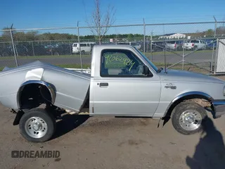 1996 Ford Ranger XL with VIN 1FTCR10A8TTA22056, listed as a IAAI auction lot 42062984 with 215,030 mi miles and . Bid and sale history available at DreamBid. Image 13.